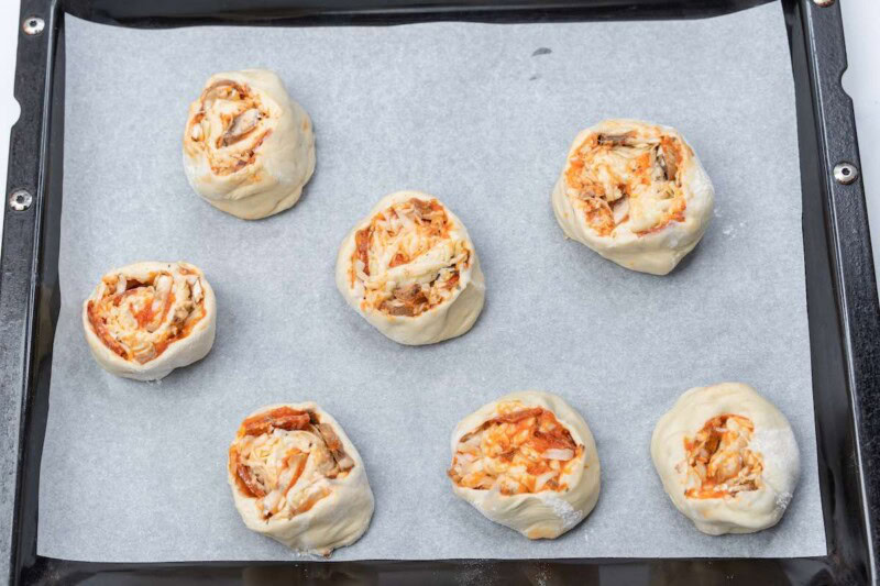 assembled pizza dough rolls ready to bake.