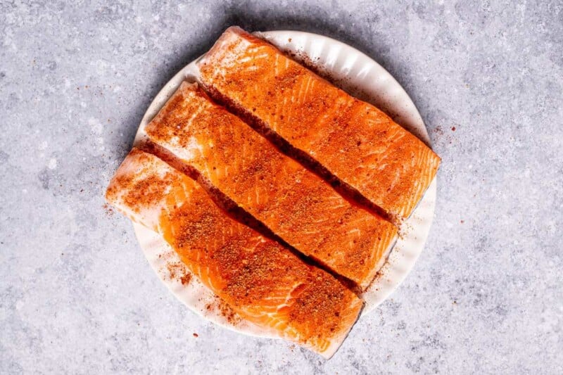 seasoned raw salmon fillets.