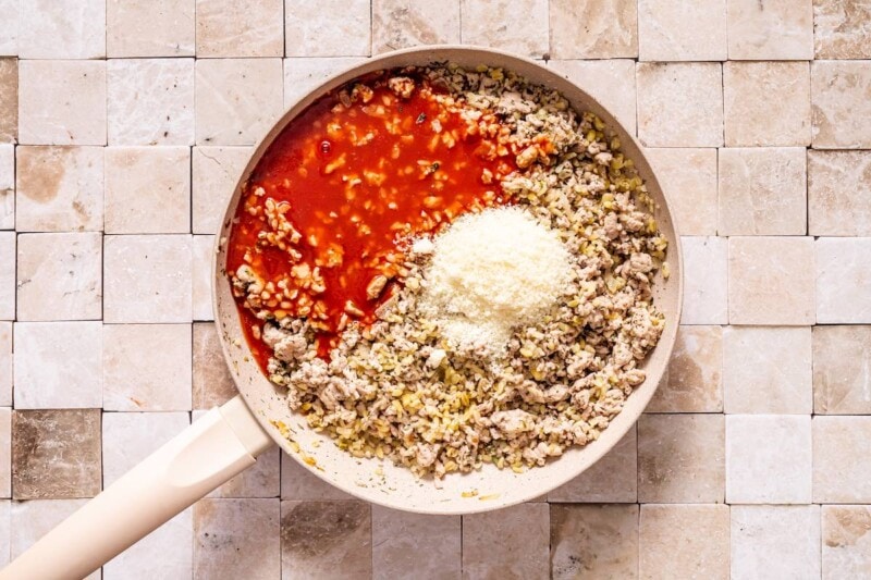 stuffed pepper filling ingredients in a skillet.