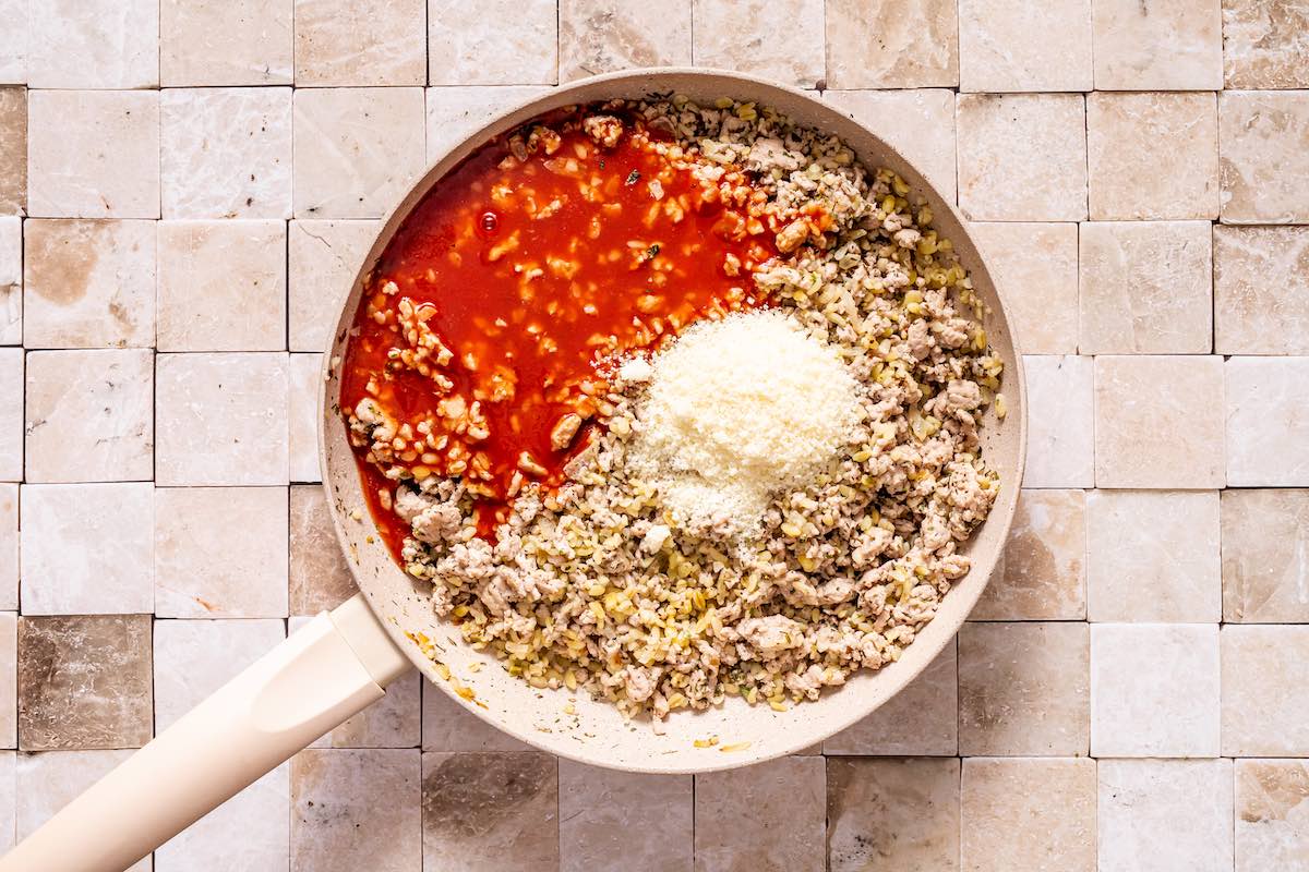 stuffed pepper filling ingredients in a skillet.