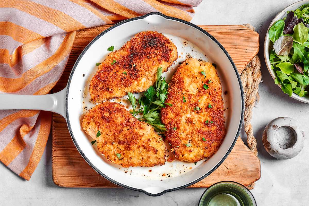 panko chicken in a skillet.