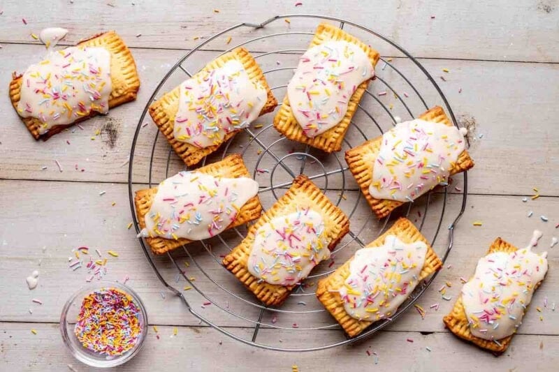 baked protein pop tarts with glaze and sprinkles on top.