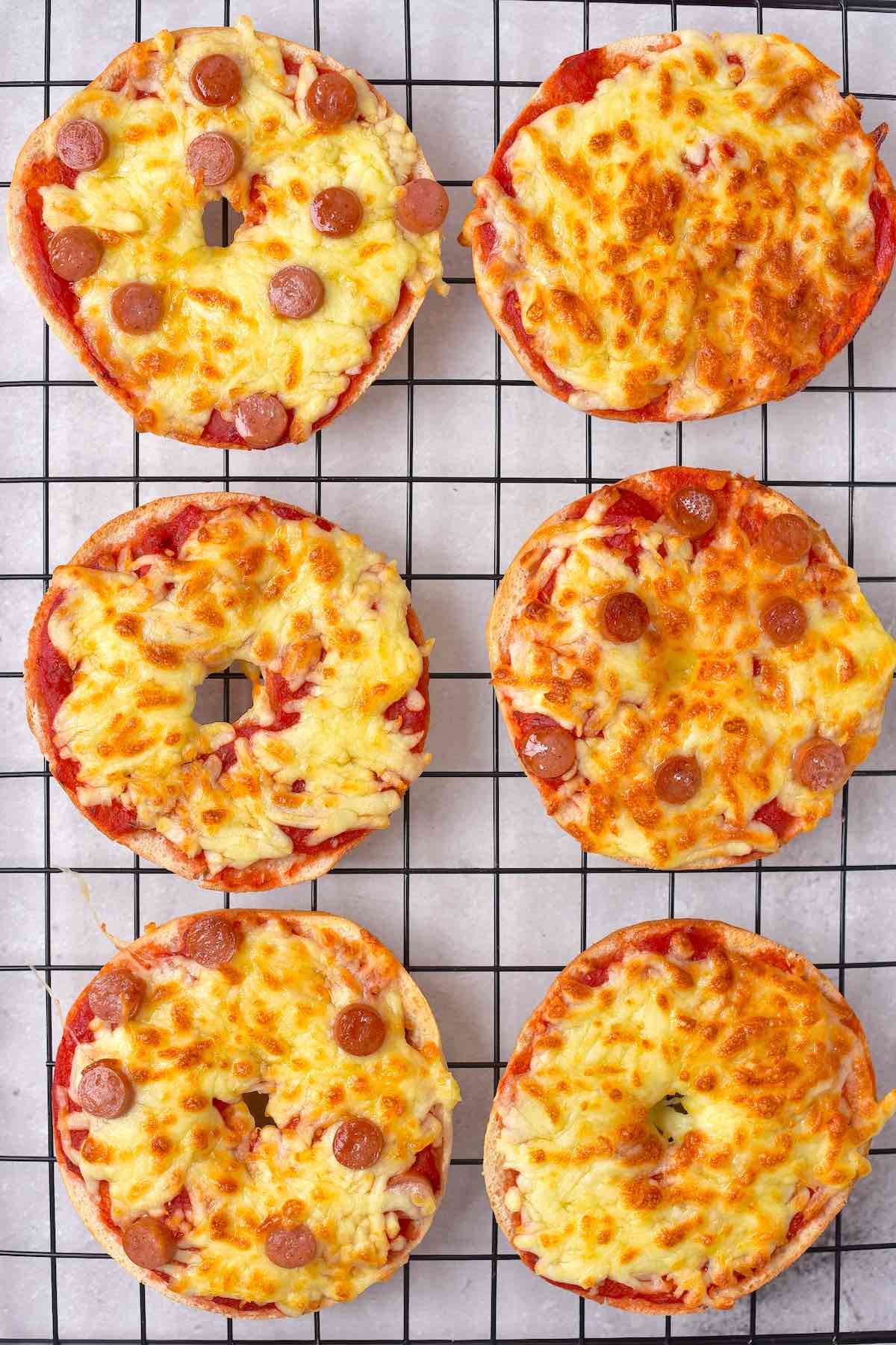 homemade air fryer bagel bites on a wire rack.