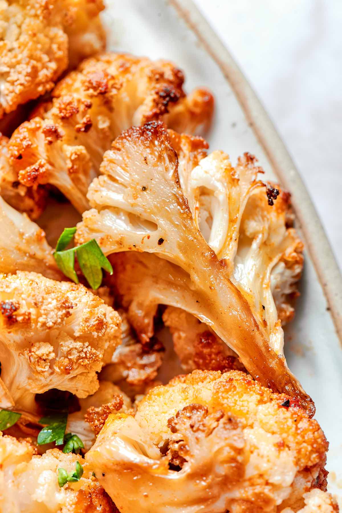 crispy air fryer cauliflower on a plate.