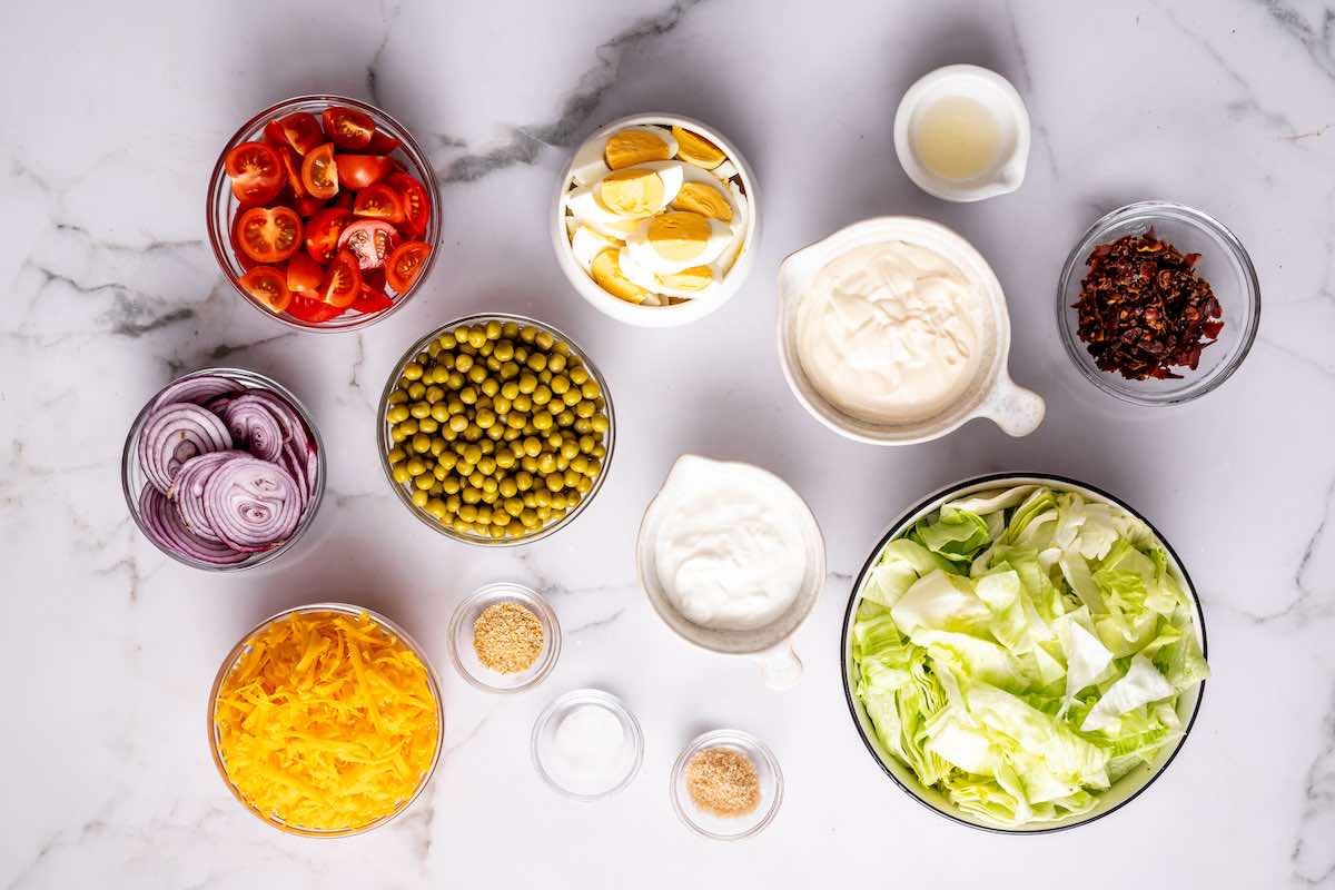 salad dressing ingredients in small bowls.