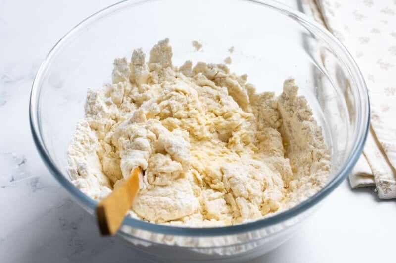 flour, baking soda, and buttermilk in a bowl.