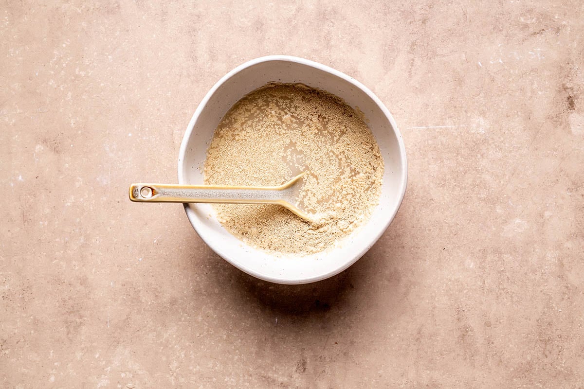 yeast and water in a bowl.