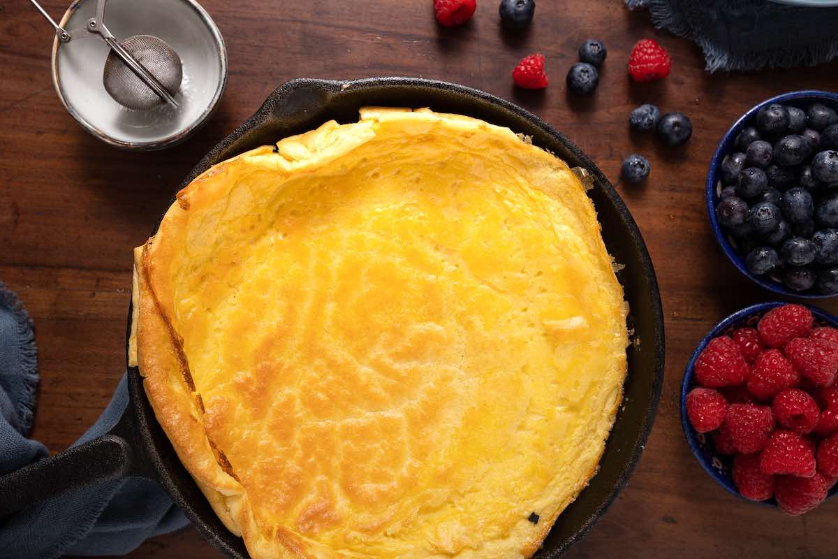 fluffy baked pancake in a skillet.