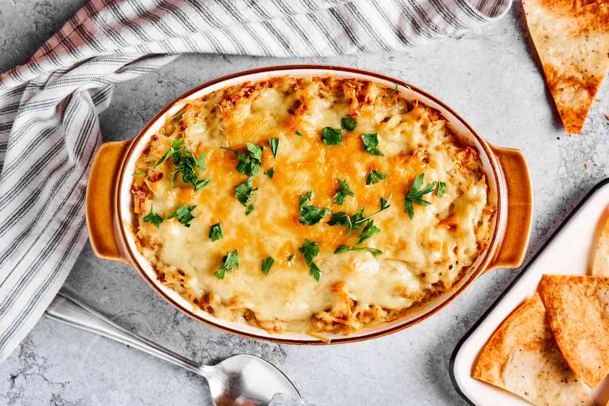 baked tuna casserole with fresh herbs on top.