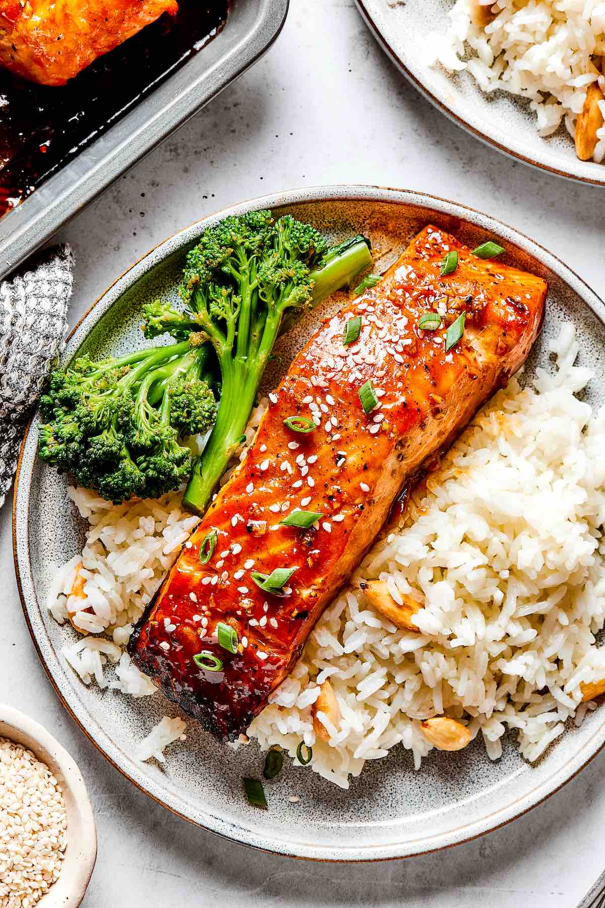 miso salmon with rice, broccolini, and green onions.