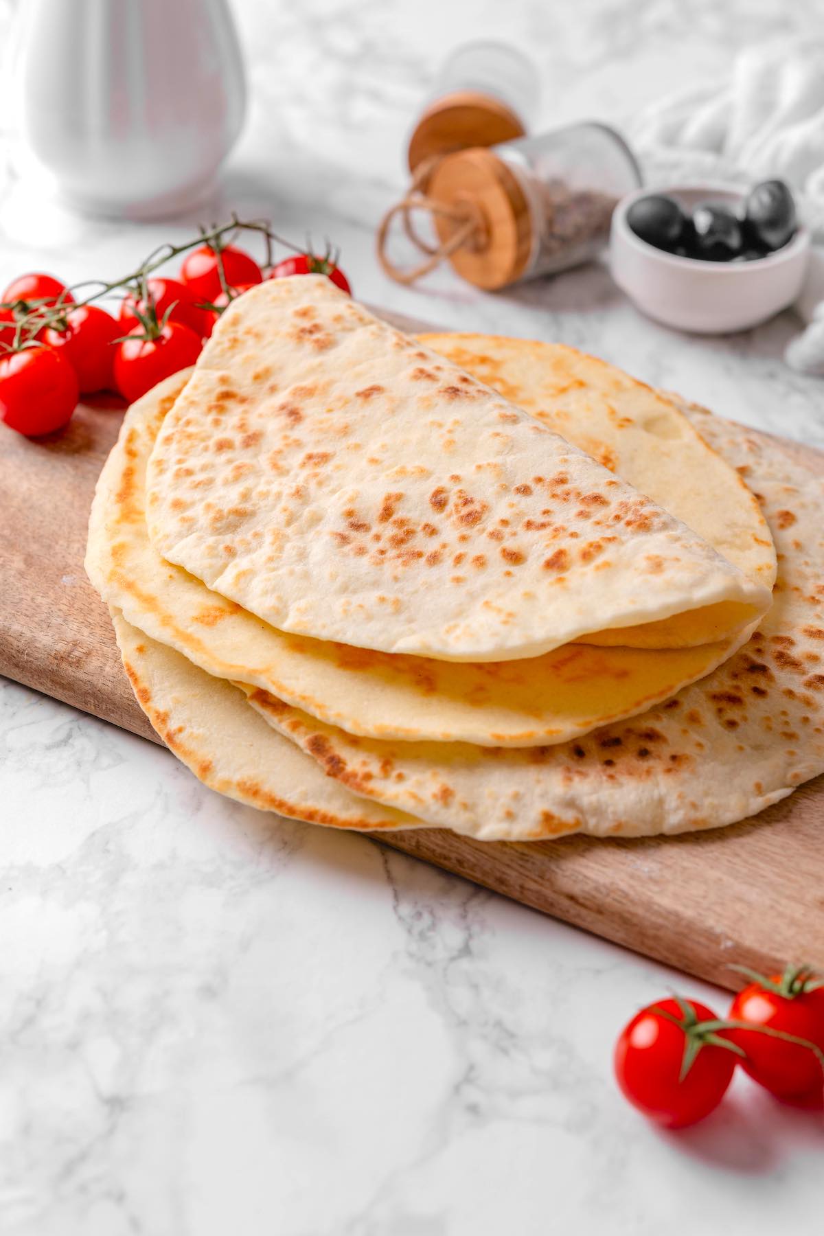 cottage cheese flatbreads on a serving board.