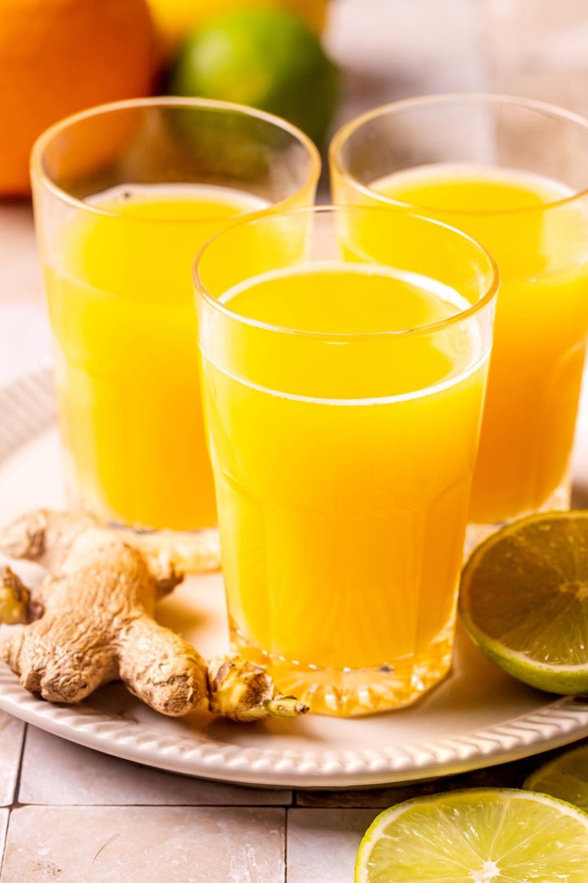 homemade ginger shots on a serving dish.