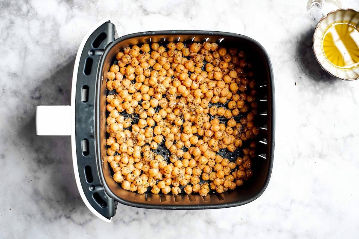 seasoned uncooked chickpeas in the air fryer.