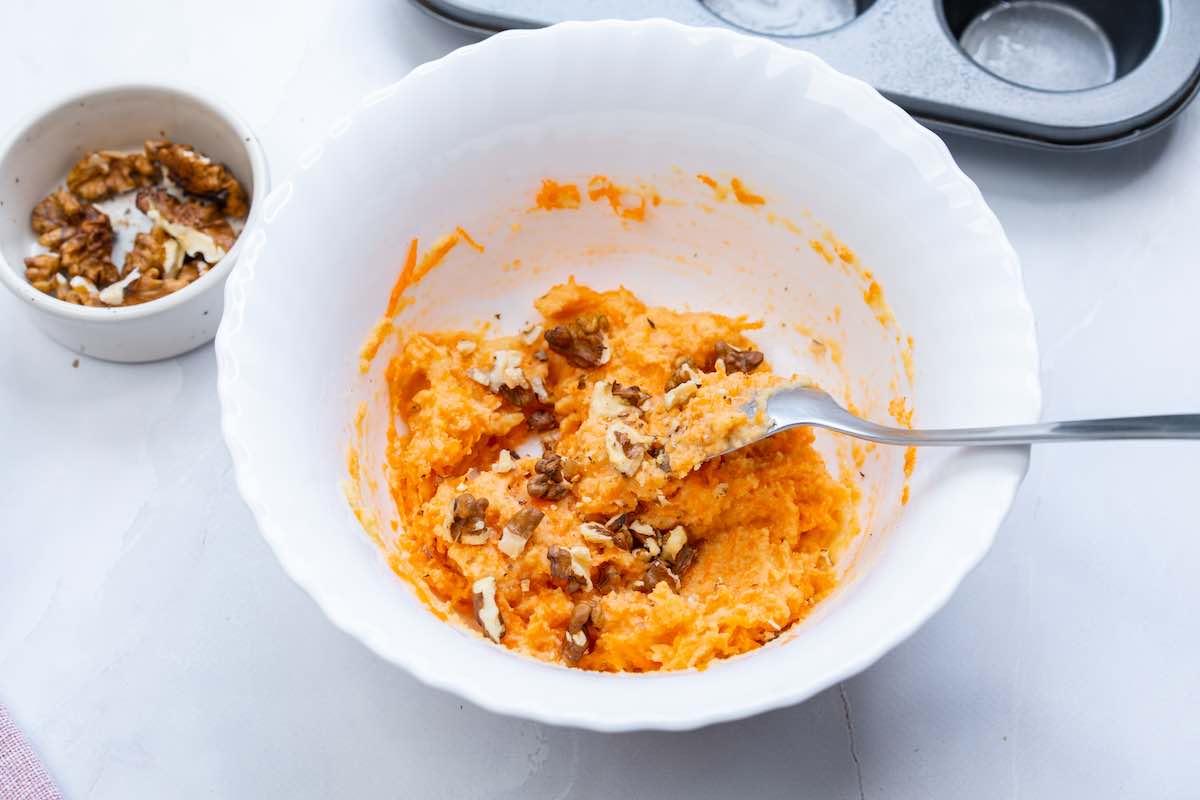 carrot muffin batter in a mixing bowl.