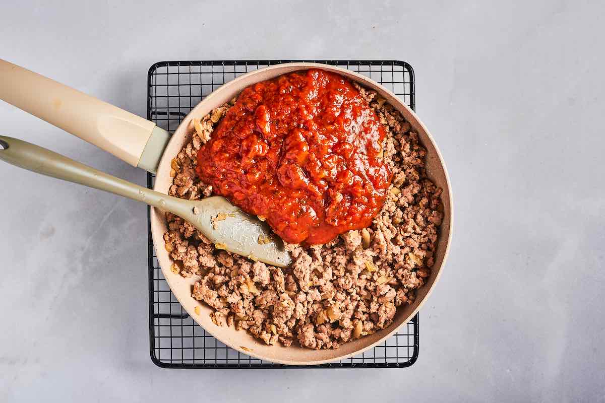 ground beef mixed with marinara sauce.