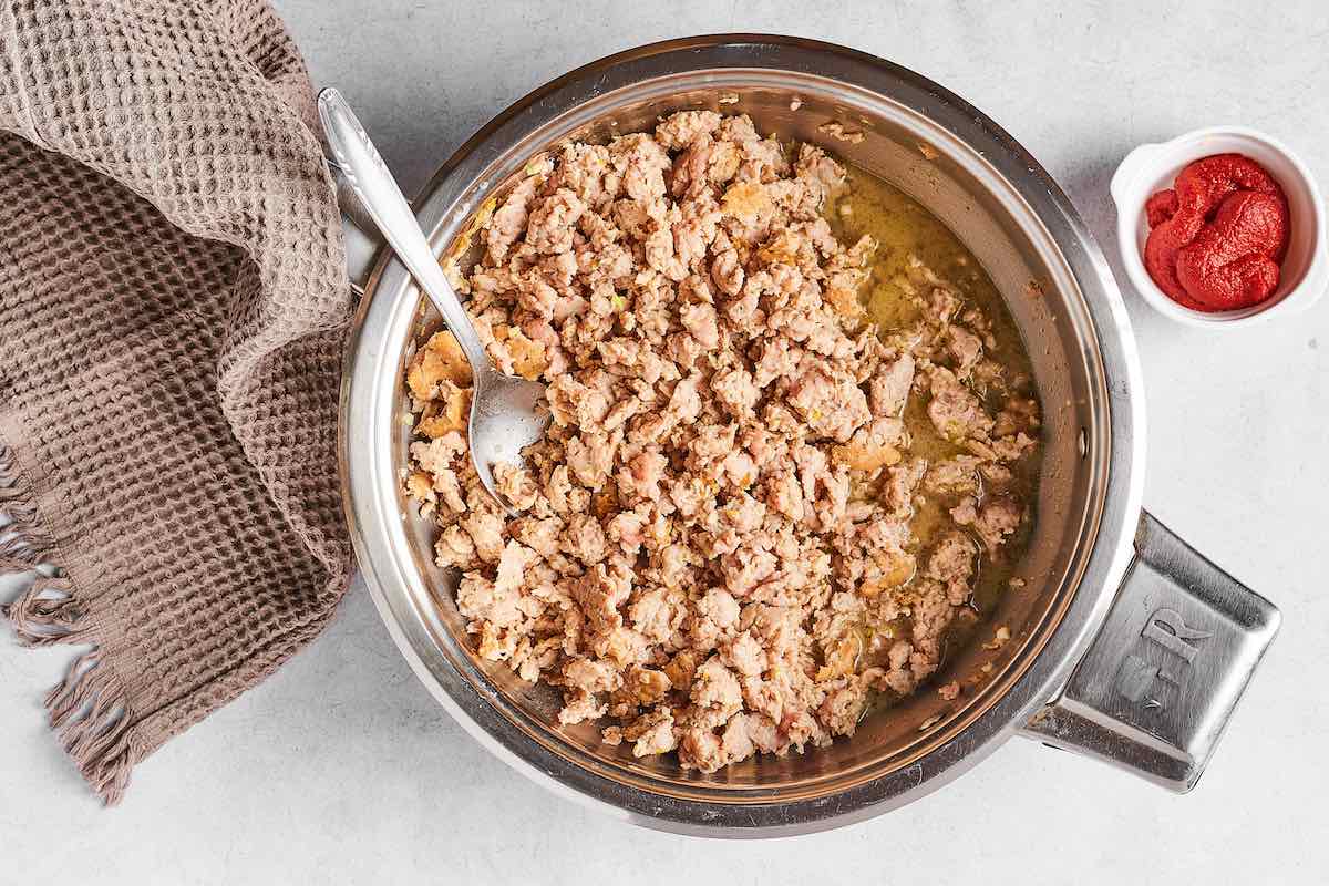 cooked ground chicken in a skillet.