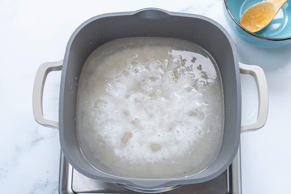 water boiling on the stove.
