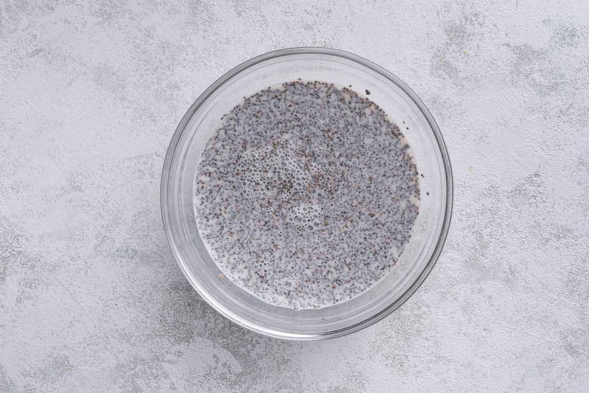 chia seed, milk, and keto maple syrup in a bowl.