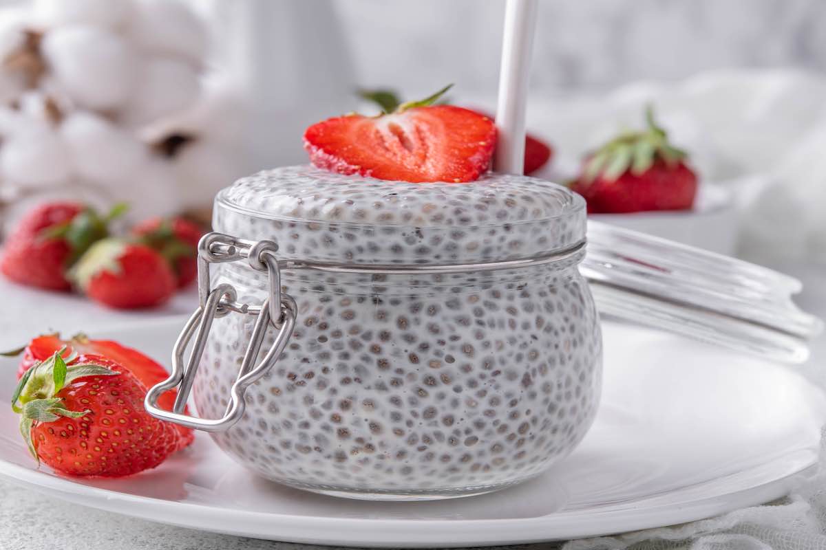assembled chia pudding with strawberries on top.