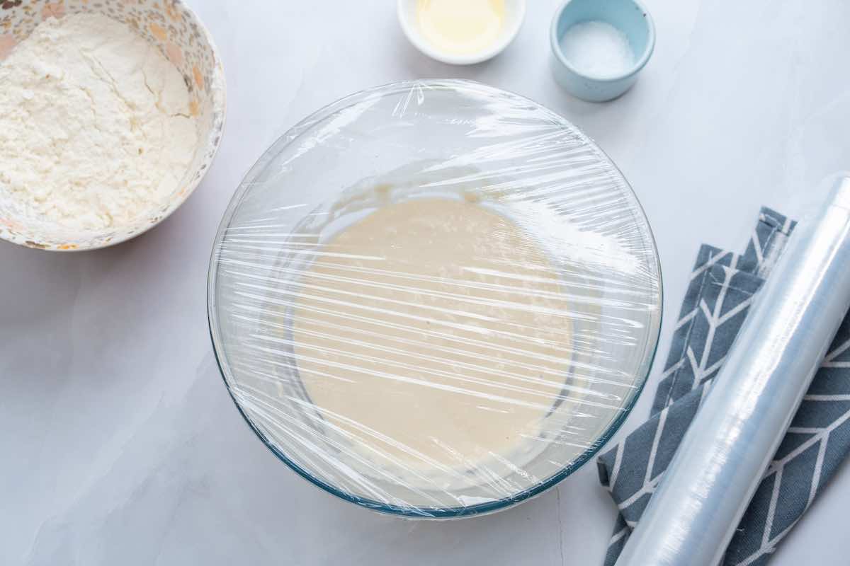 bread mixture covered in wrap.