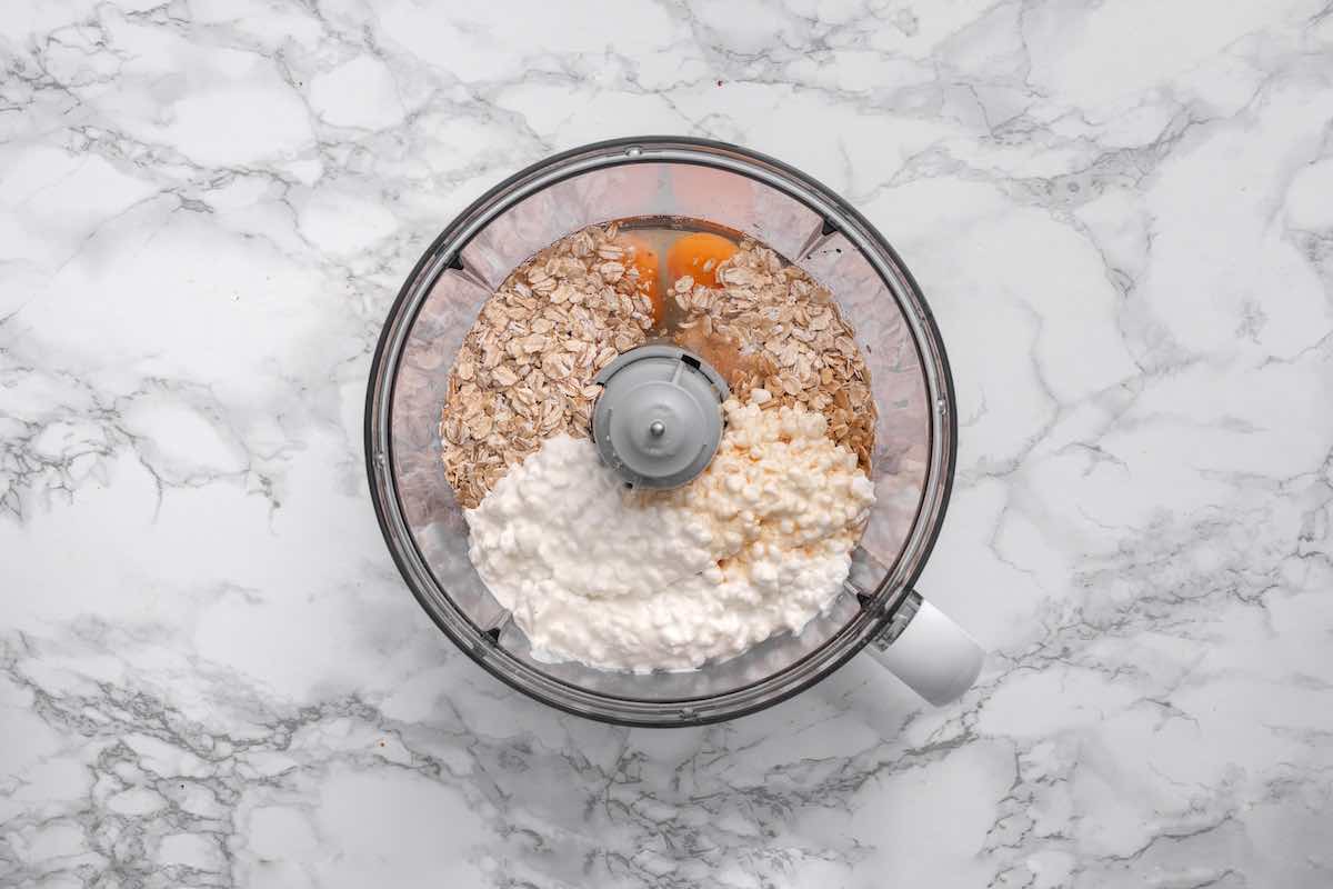 eggs, protein powder, cottage cheese, and rolled oats in a blender.