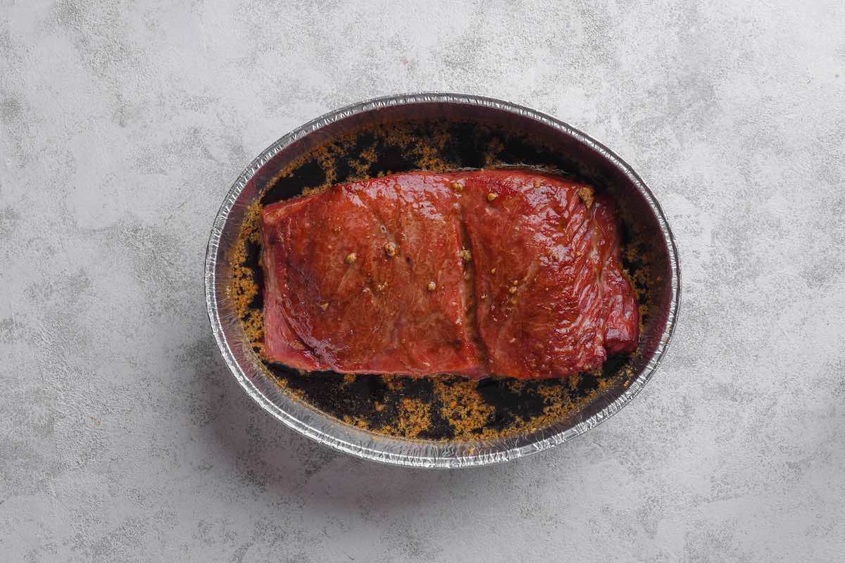 corned beef soaking in smoking solution.