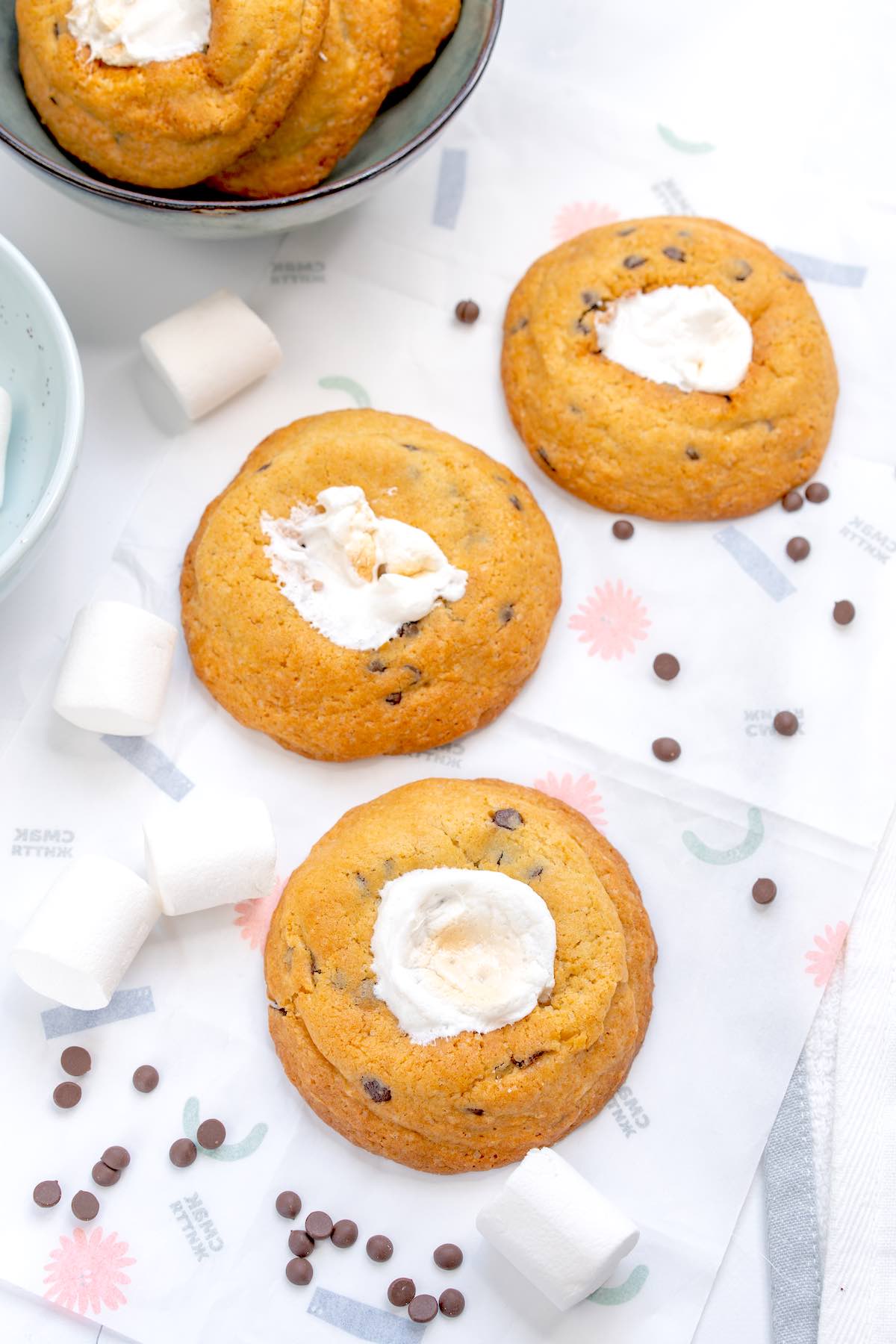 chocolate chip marshmallow cookies on a baking sheet.