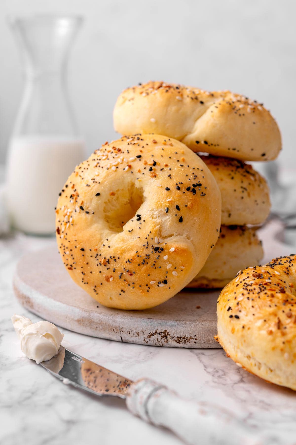 protein bagels with cream cheese on a plate.
