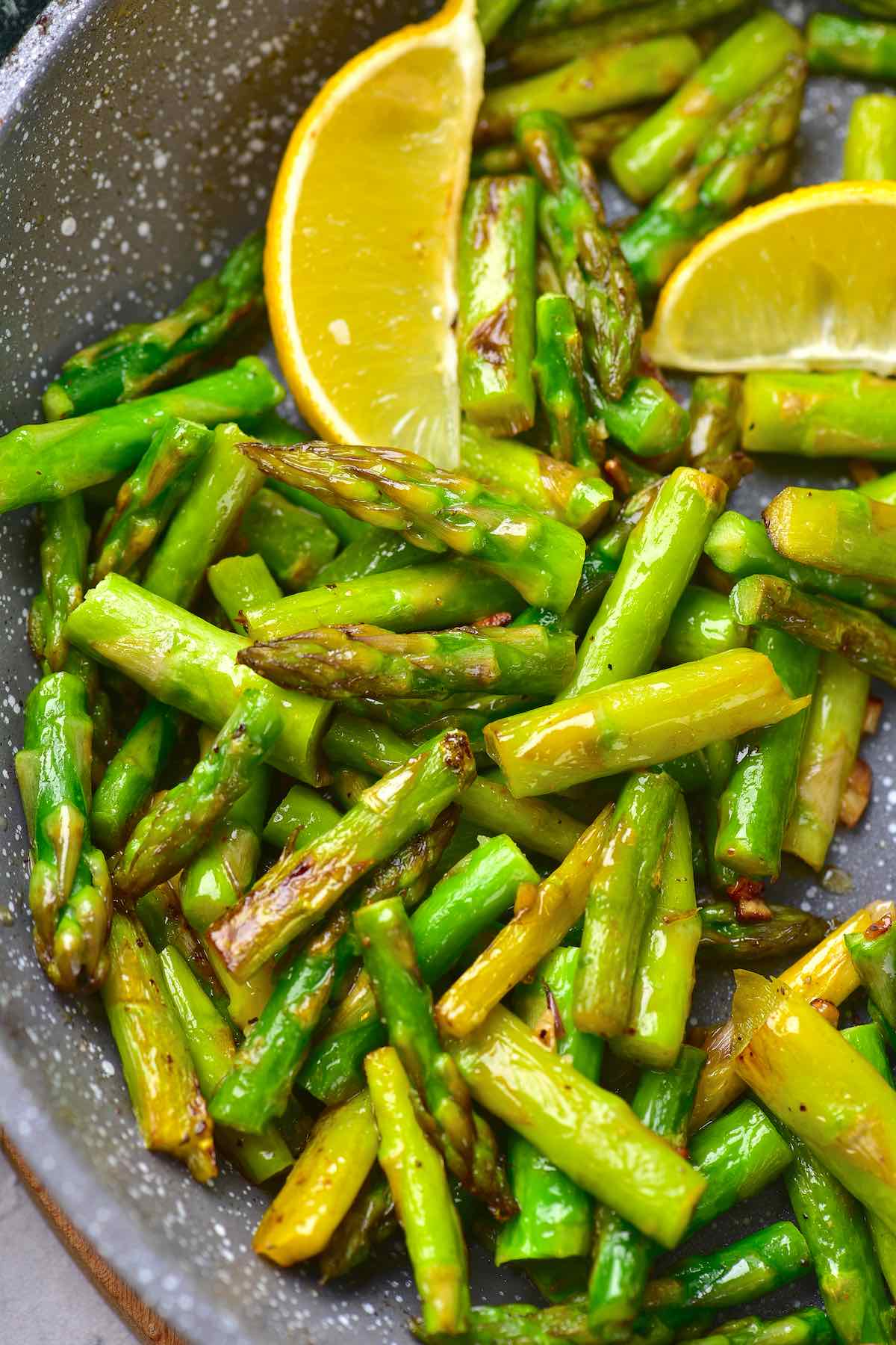 sauteed asparagus with fresh lemon slices.
