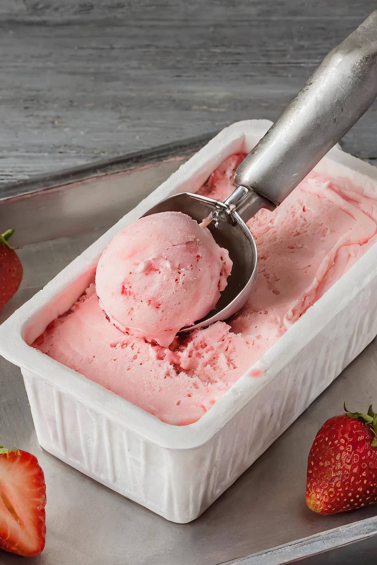 strawberry ice cream in a cone.