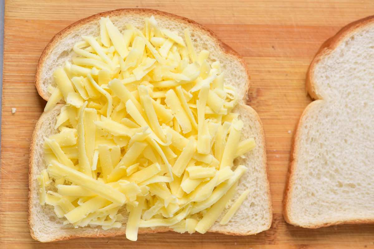 cheese added on top of bread.