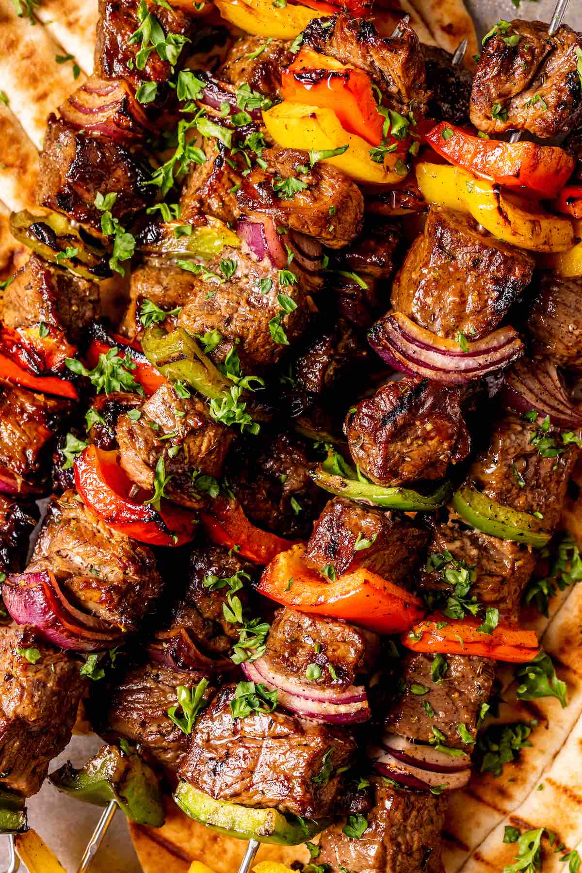 beef kabobs on pita bread.
