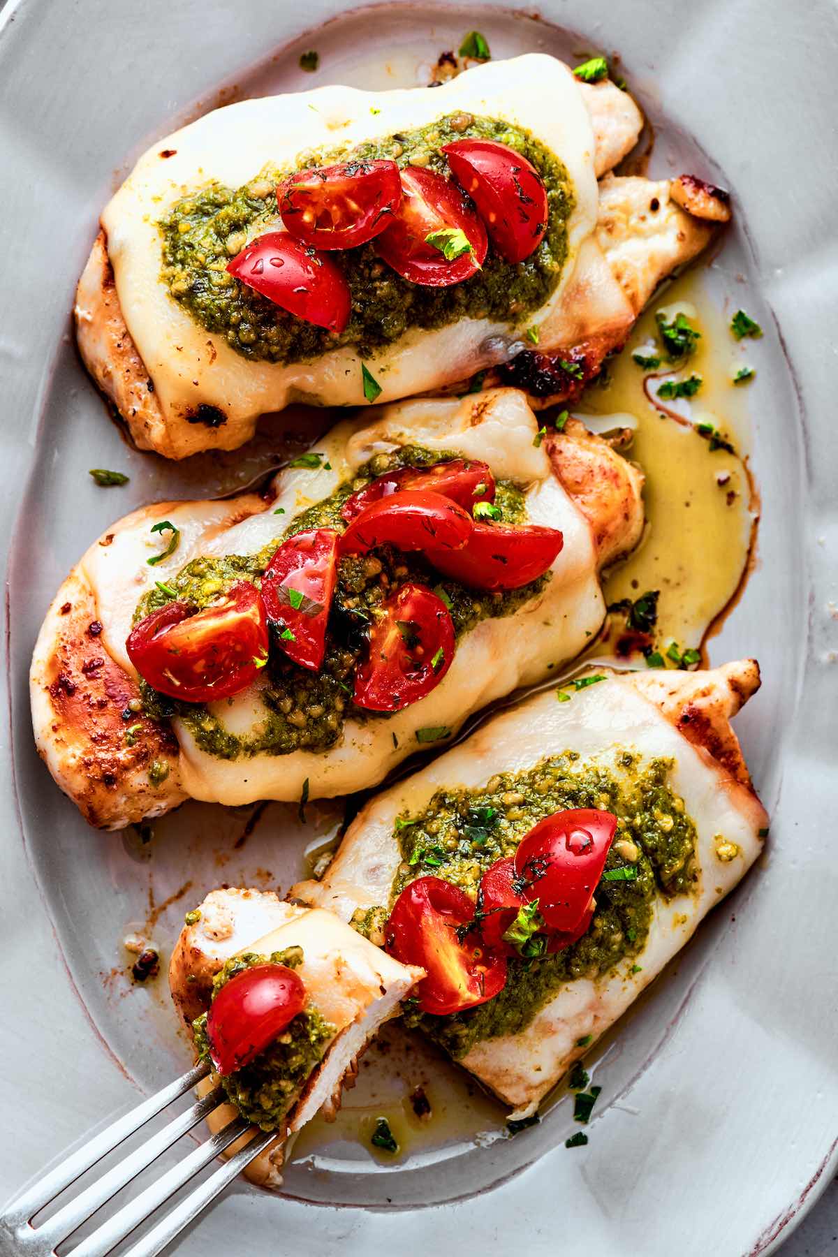 chicken margherita on a plate.