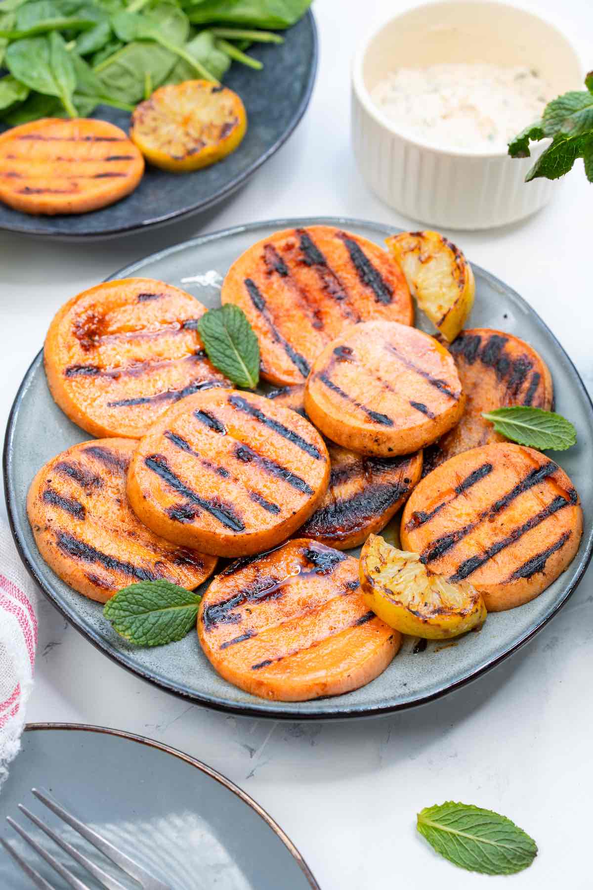 grilled sweet potatoes on a plate.