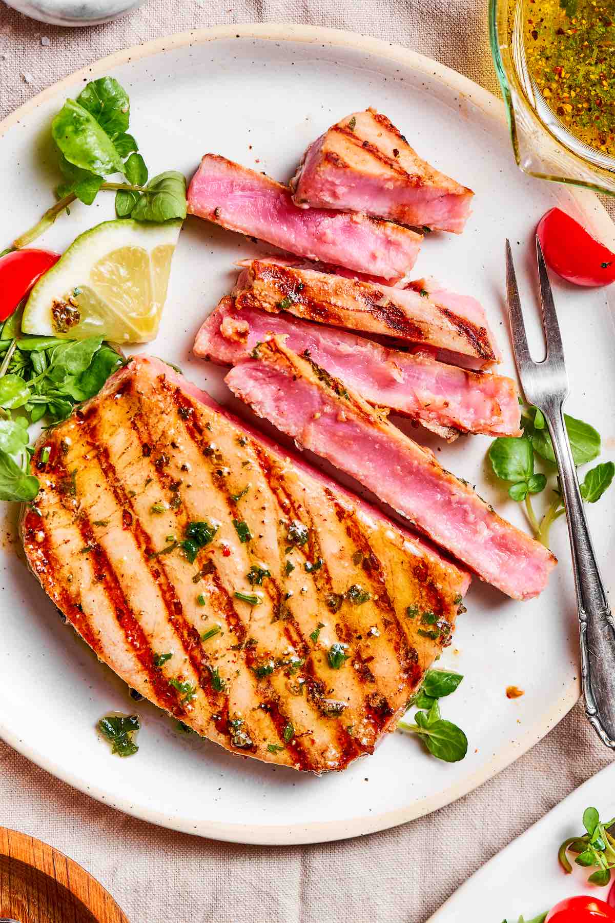grilled tuna steak on a plate.