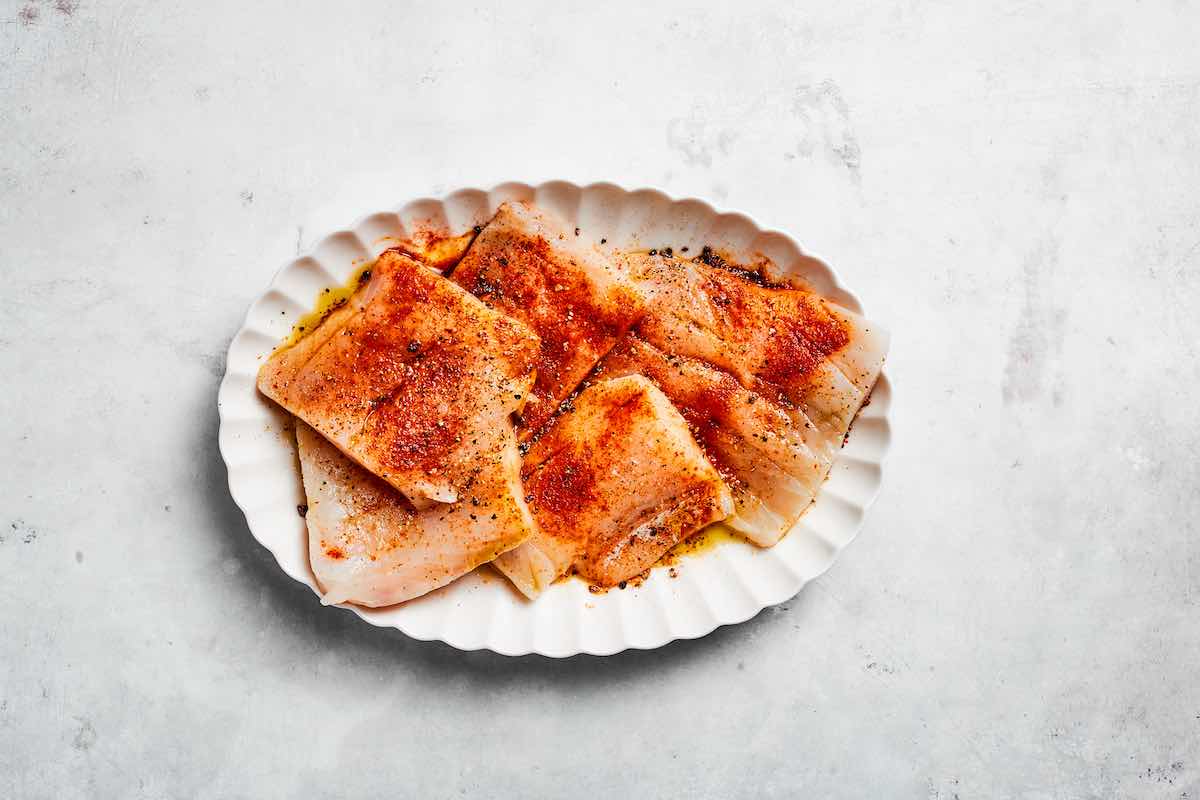 raw seasoned cod fillets.