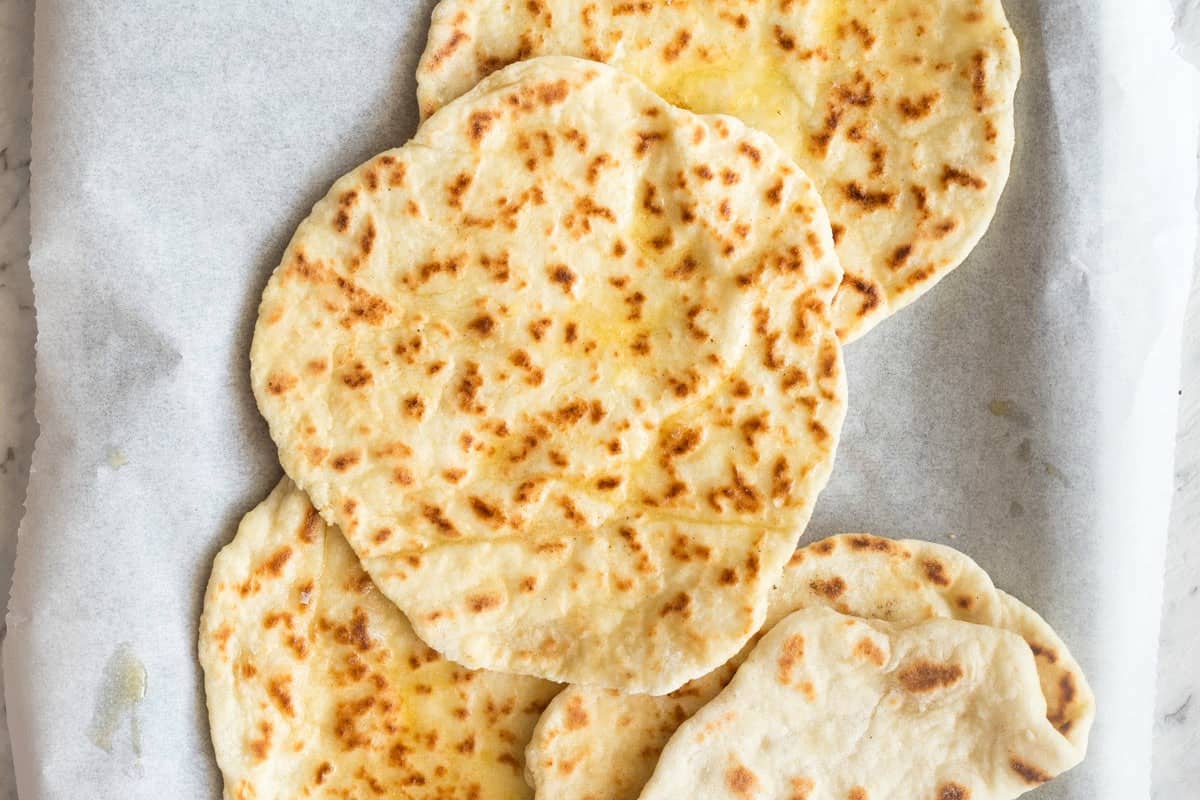 2 ingredient flatbread on a baking sheet.