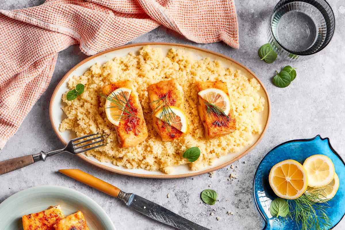 baked halibut in a serving dish.