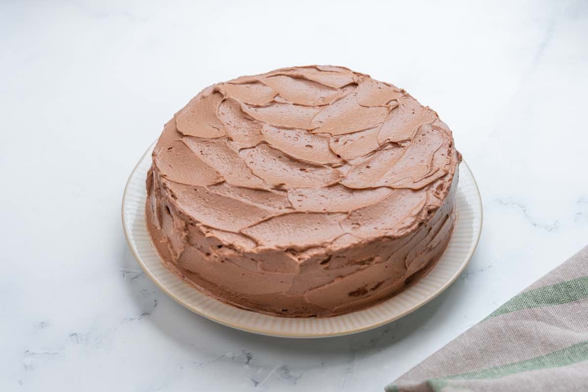 baked and frosted chocolate zucchini cake.