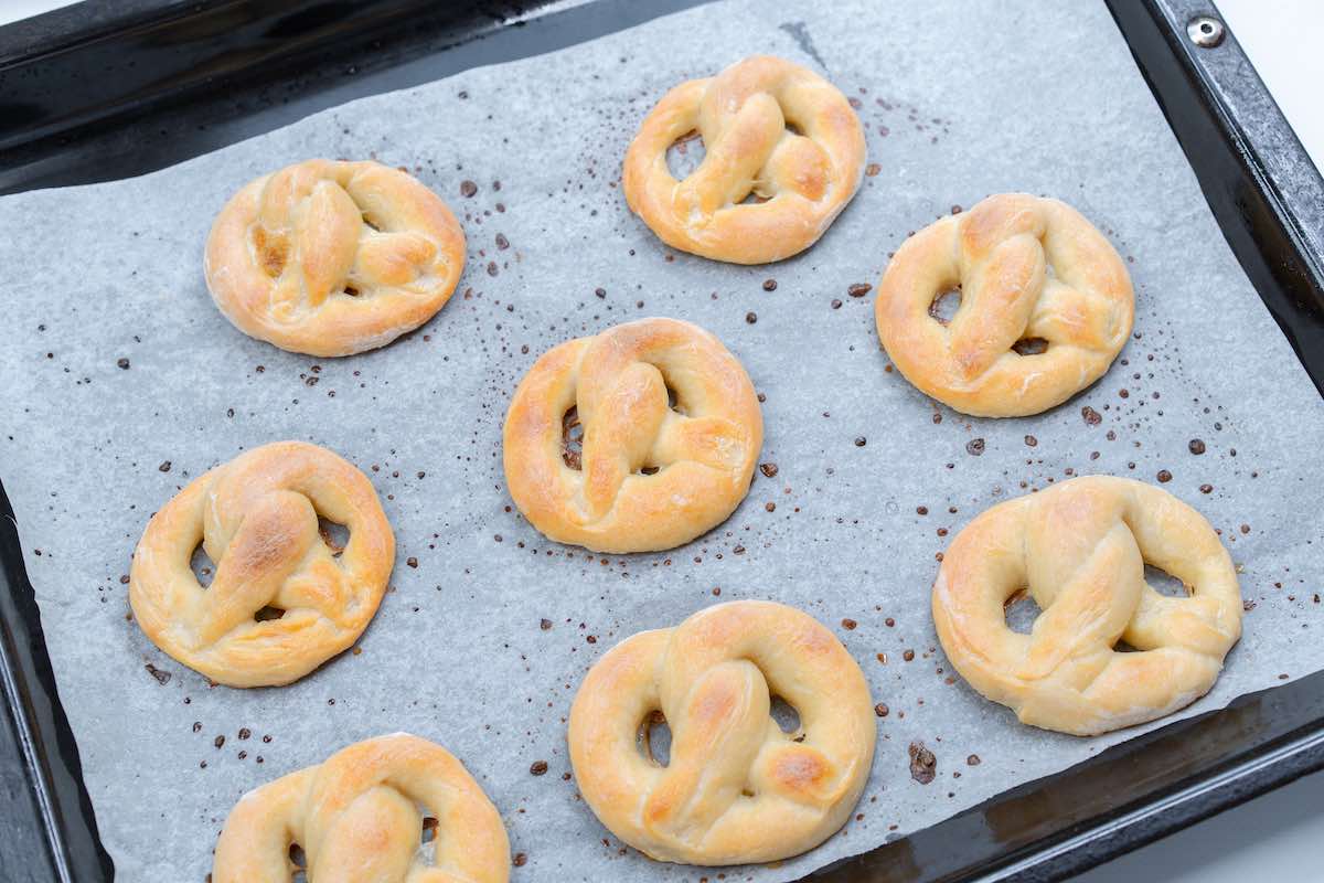 baked pretzels on a baking sheet.
