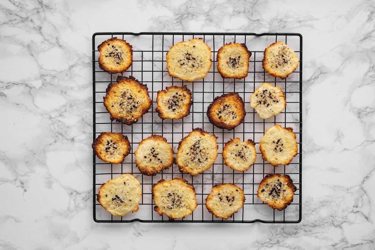 baked cottage cheese chips on a wire rack.