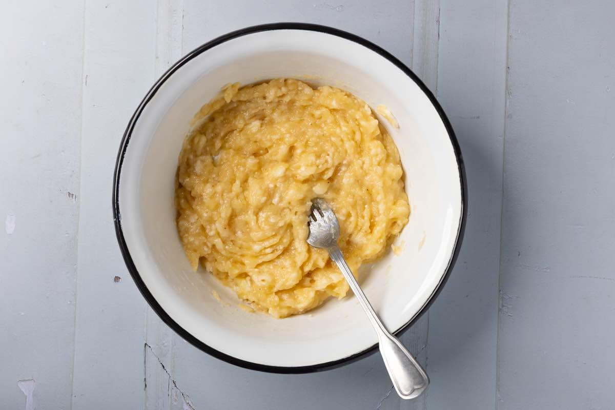 mashed bananas in a bowl.