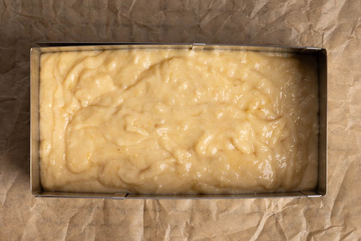 banana bread batter in a loaf pan.