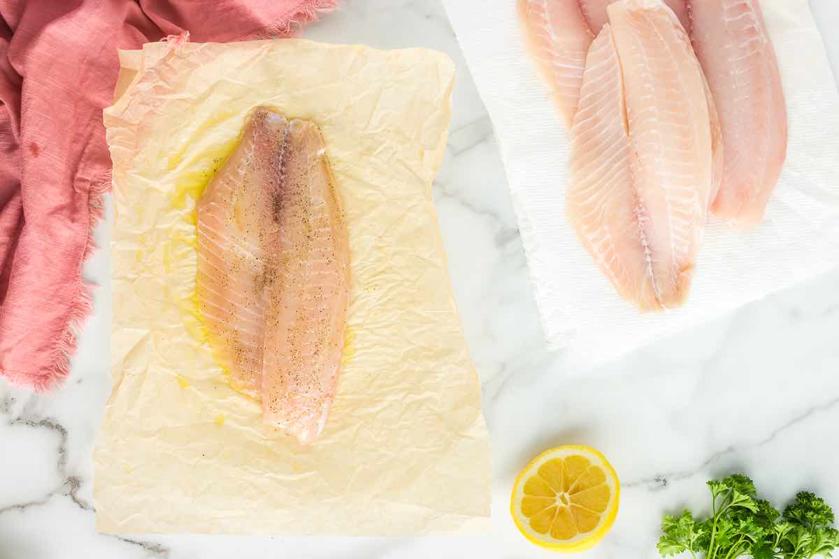 seasoned and oiled tilapia fillets.