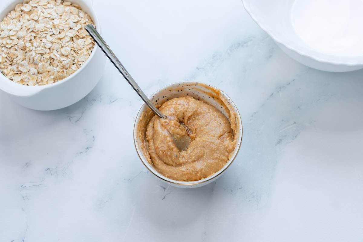 peanut butter and maple syrup melted together in a bowl.