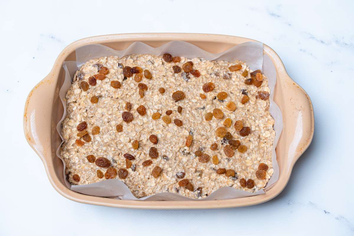 assembled raisin bars in a baking dish.