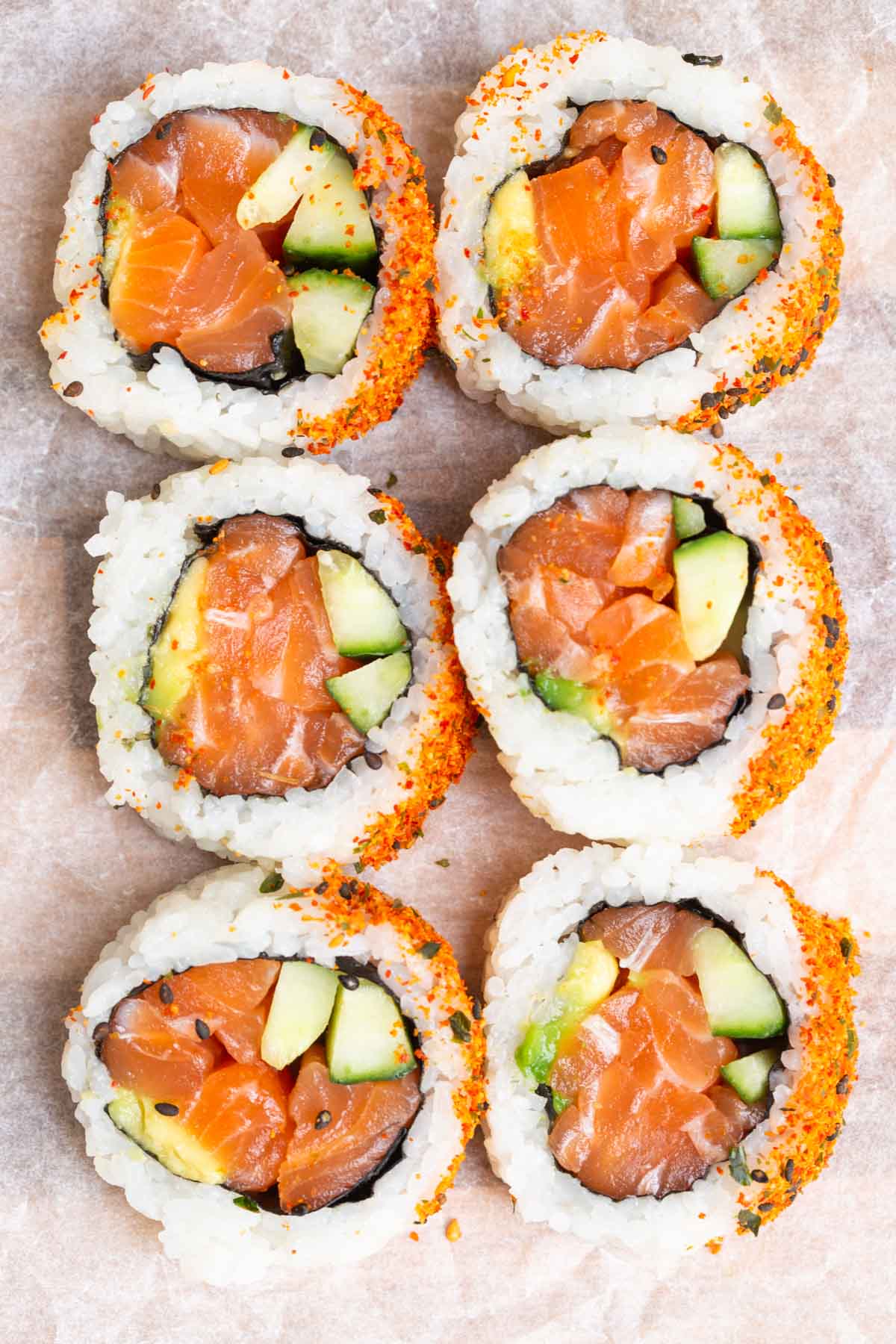 Homemade salmon sushi rolls using Instant Pot sushi rice.