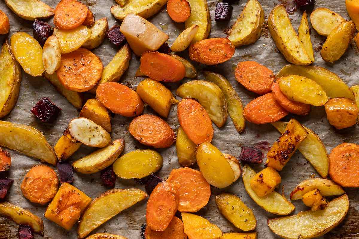 baking sheet with roasted root vegetables on it.
