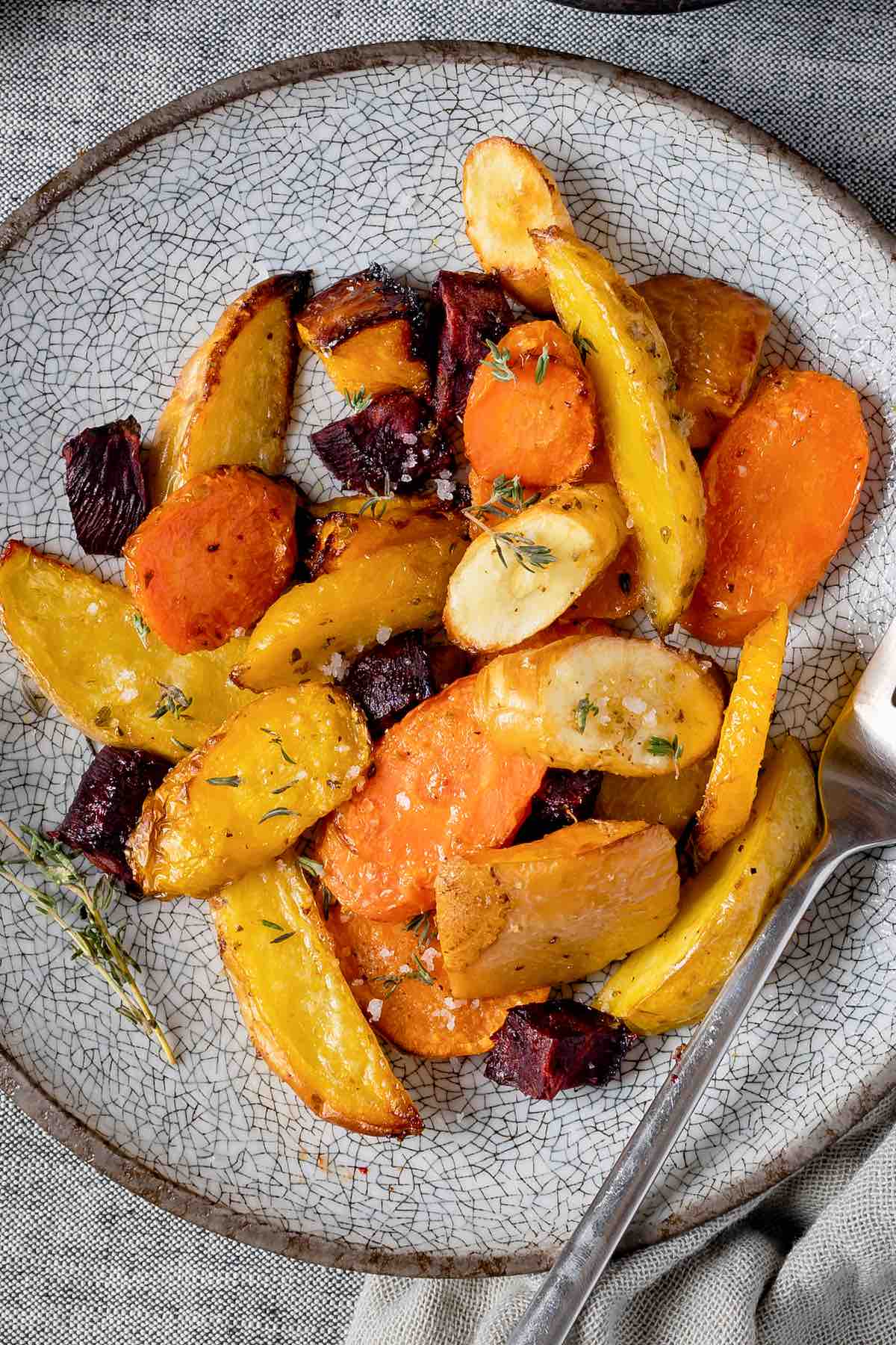 roasted root vegetables on a plate.