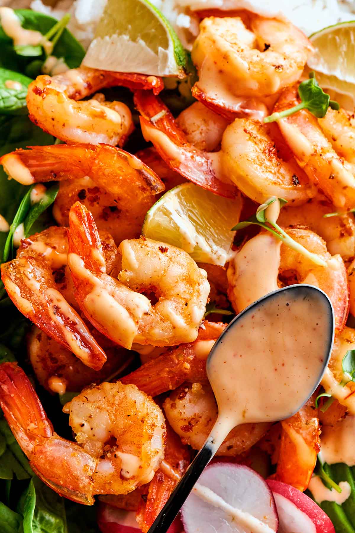 sauteed shrimp over baby spinach and lemon.